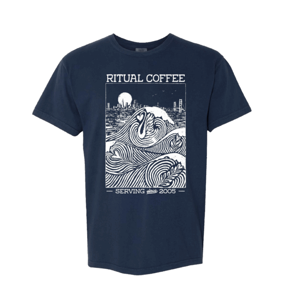 Navy shirt with illustration of waves forming latte art